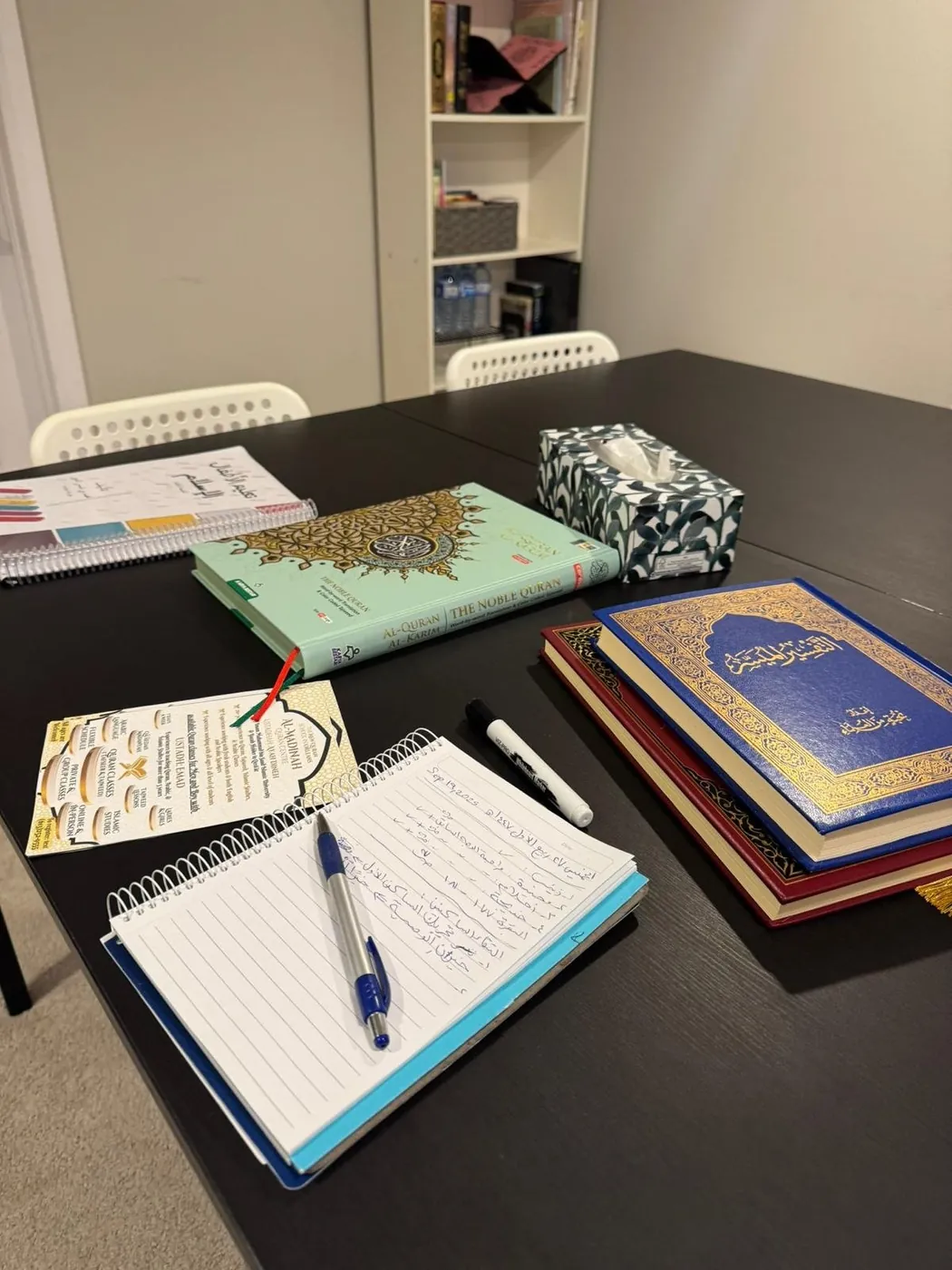 Study table with notebook and books